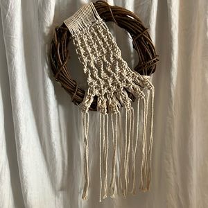 Macrame wall hanging on grapevine wreath